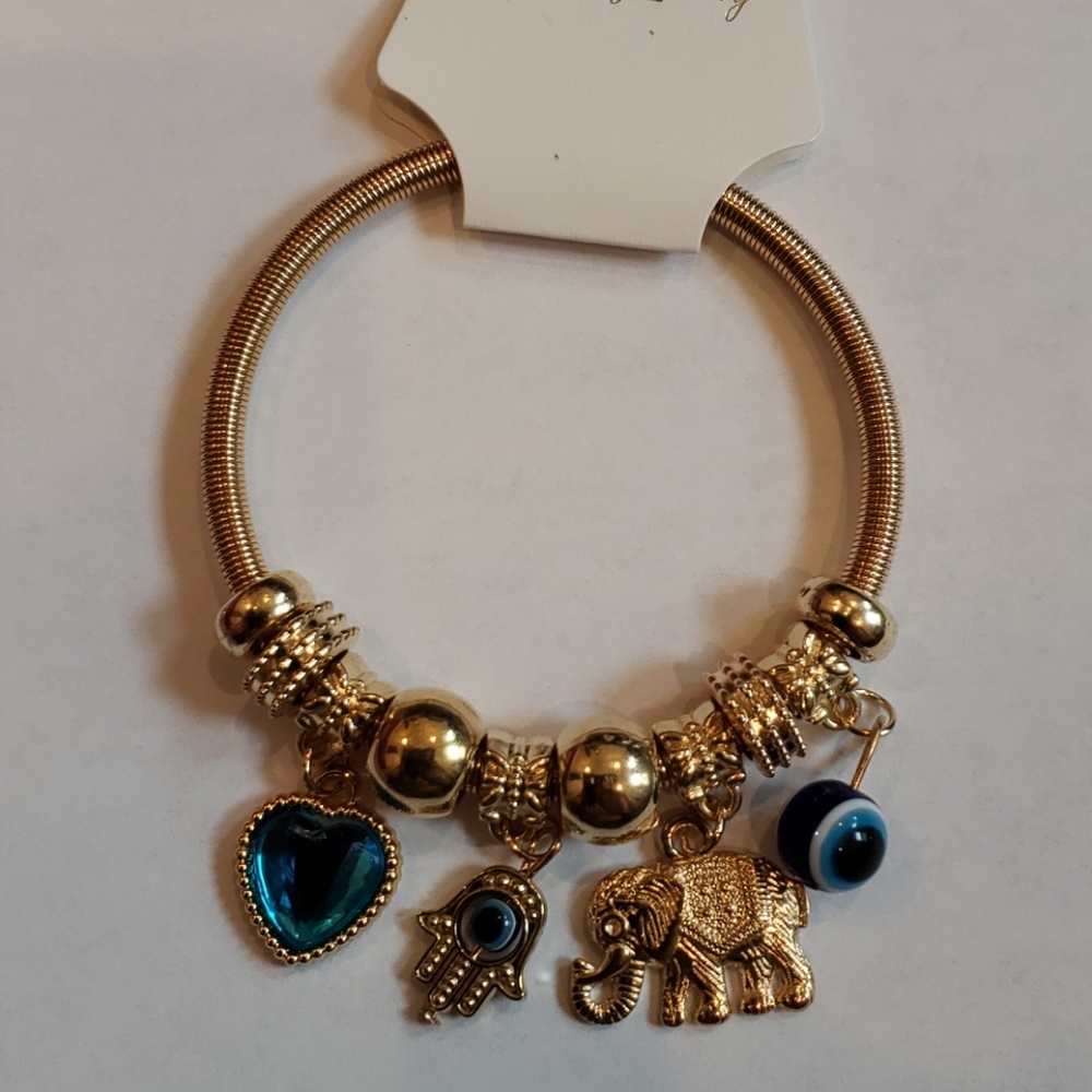 Charm bracelet with beads gold color